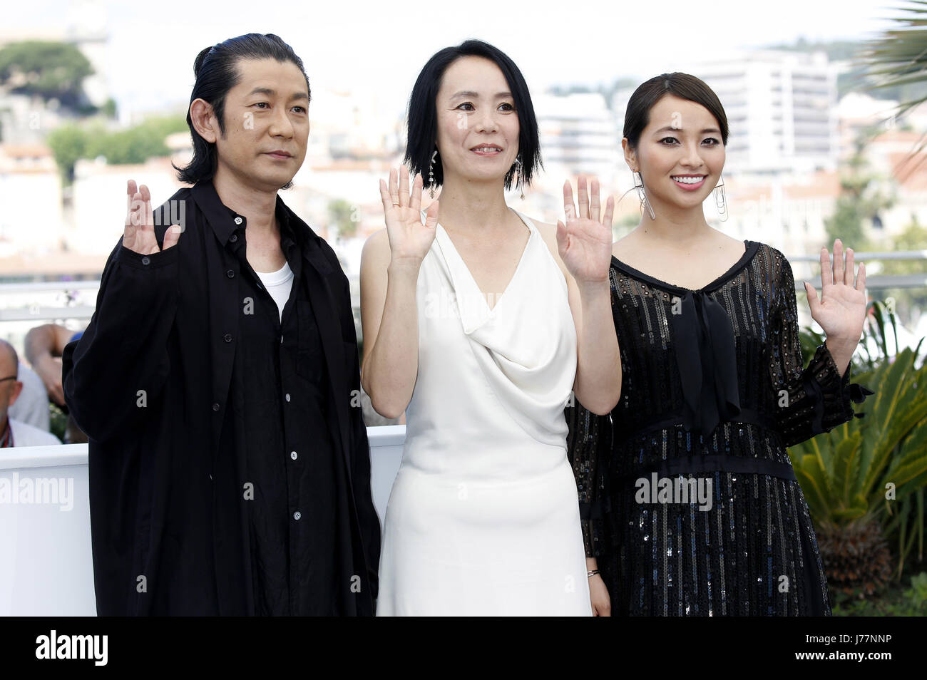 Masatoshi Nagase, Misuzu Kanno and Ayame Misaki at the 'Radiance / Hikari / Vers la lumière' photocall during the 70th Cannes Film Festival at the Palais des Festivals on May 23, 2017 in Cannes, France | Verwendung weltweit Stock Photo