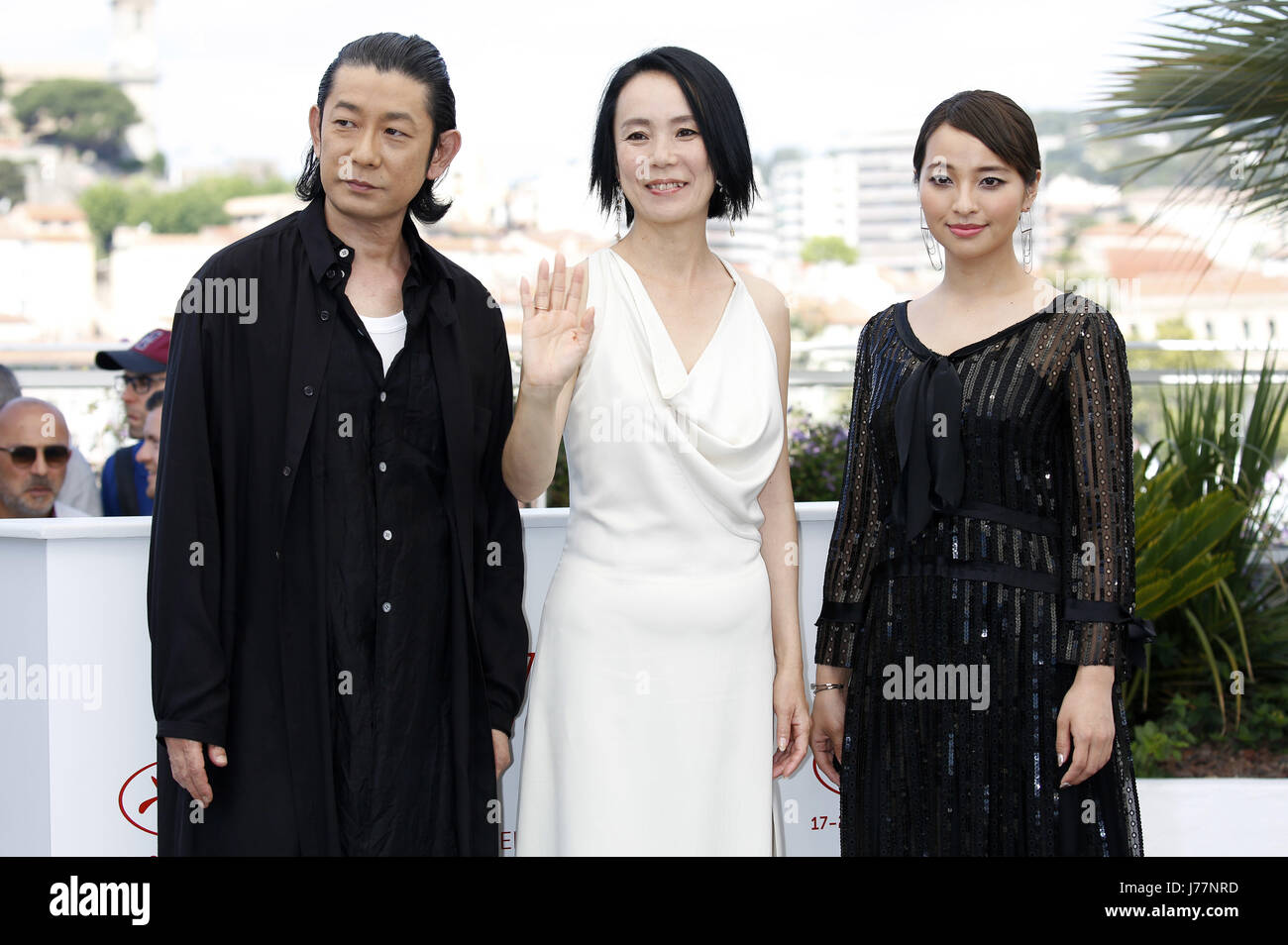 Masatoshi Nagase, Misuzu Kanno and Ayame Misaki at the 'Radiance / Hikari / Vers la lumière' photocall during the 70th Cannes Film Festival at the Palais des Festivals on May 23, 2017 in Cannes, France | Verwendung weltweit Stock Photo