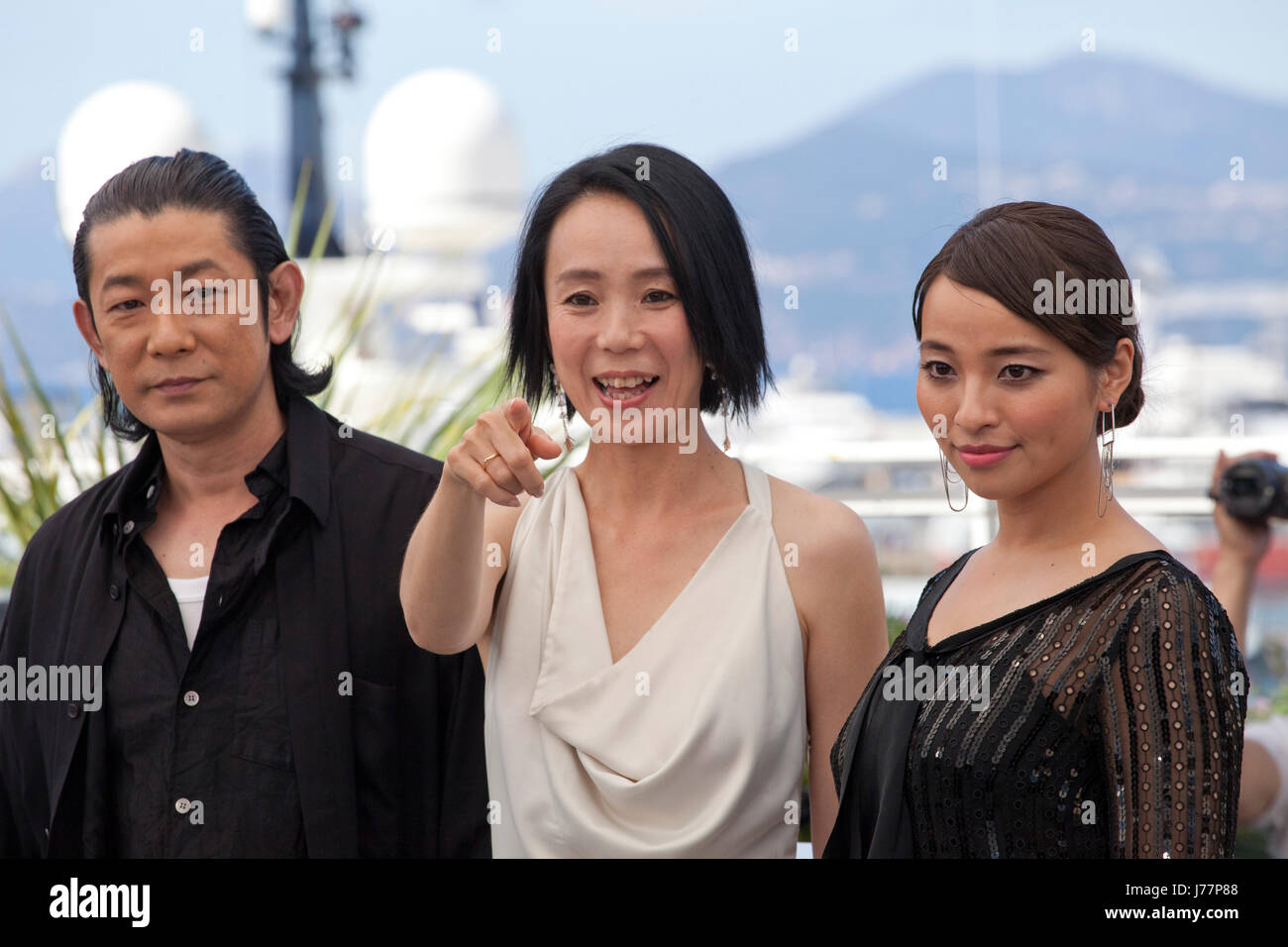 Cannes, France. 23rd May, 2017. Nagase Masatoshi, Director Naomi Kawase and Ayame Misaki at the Hikari (Vers La Lumiere / Radiance) photo call at the 70th Cannes Film Festival Tuesday 23rd May 2017, Cannes, France. Credit: Doreen Kennedy/Alamy Live News Stock Photo