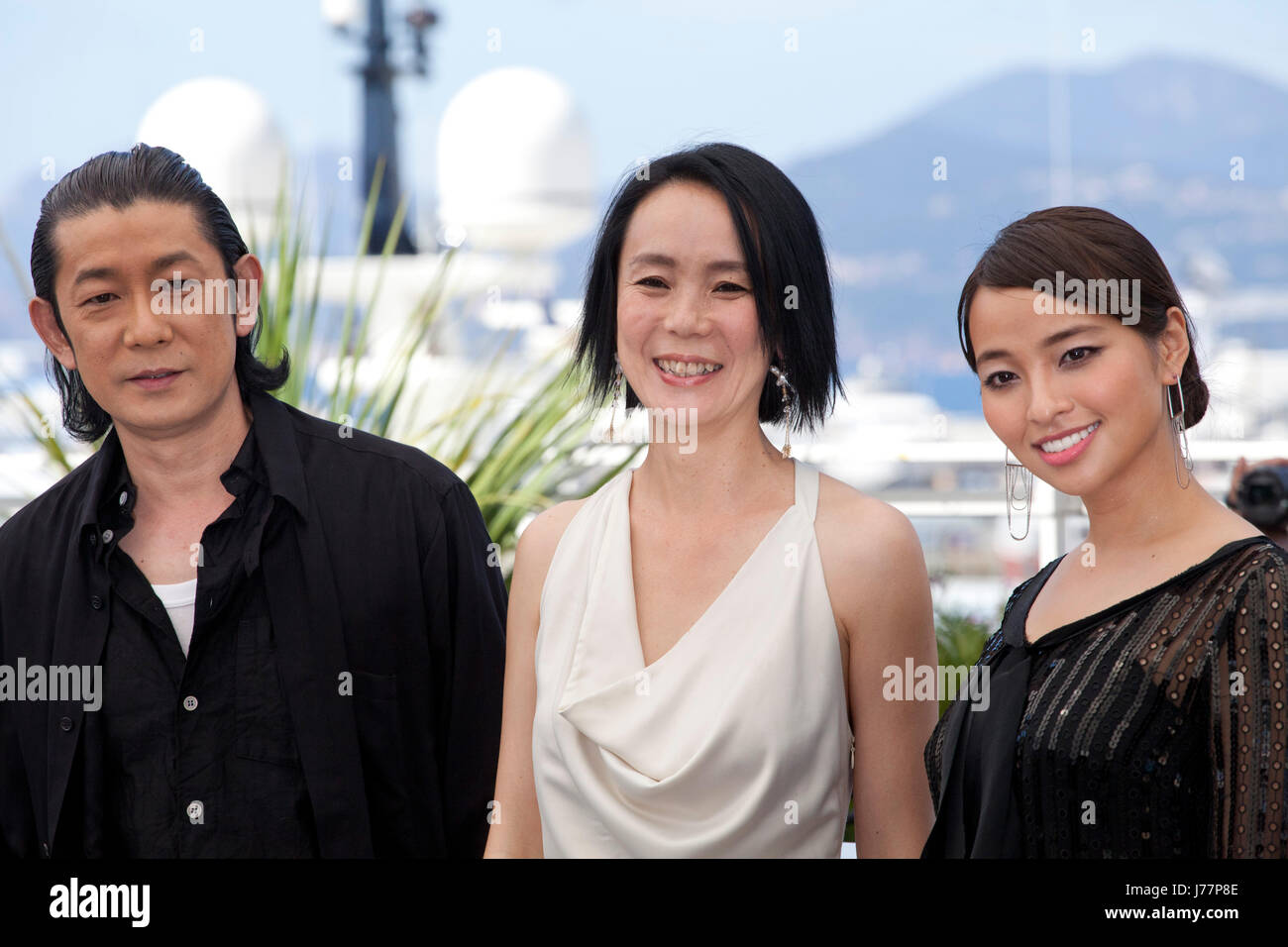 Cannes, France. 23rd May, 2017. Nagase Masatoshi, Director Naomi Kawase and Ayame Misaki at the Hikari (Vers La Lumiere / Radiance) photo call at the 70th Cannes Film Festival Tuesday 23rd May 2017, Cannes, France. Credit: Doreen Kennedy/Alamy Live News Stock Photo