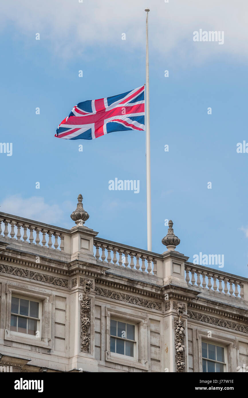 London, UK. 24th May, 2017. A flag flies at half mast in Whitehall as