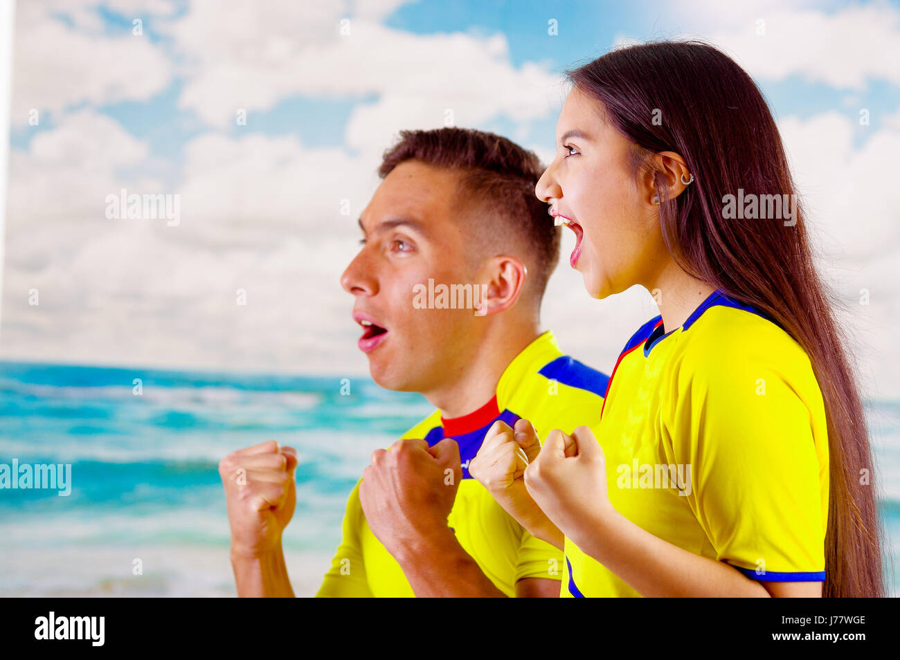Young ecuadorian couple wearing official Marathon football shirt ...