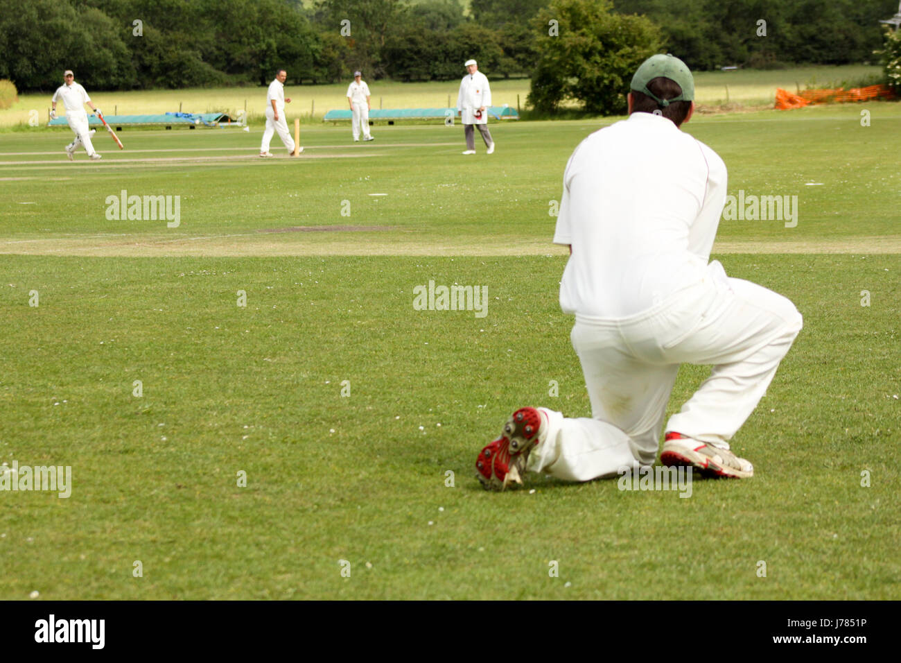 Fielding at a game of cricket Stock Photo