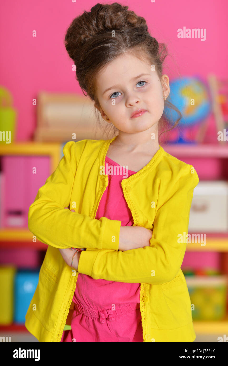 Portrait of a beautiful little girl posing Stock Photo - Alamy