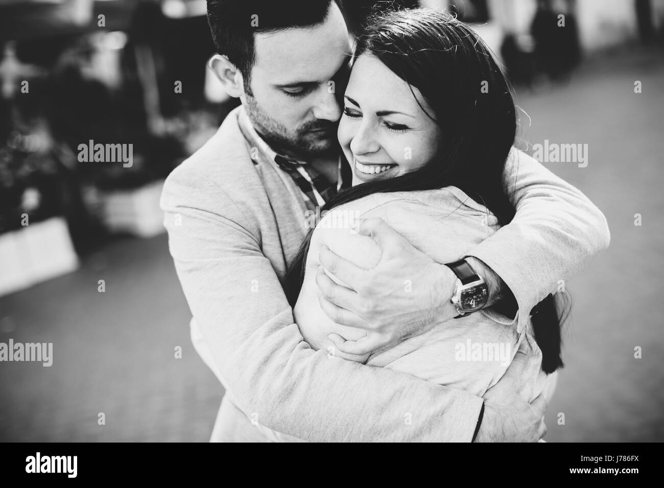 Portrait happy couple hugging Black and White Stock Photos & Images - Alamy