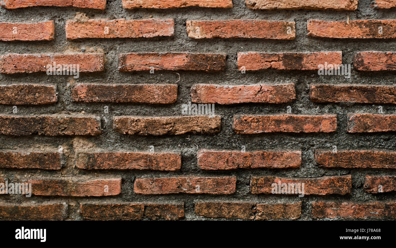 Old brick wall texture in a background image Stock Photo - Alamy