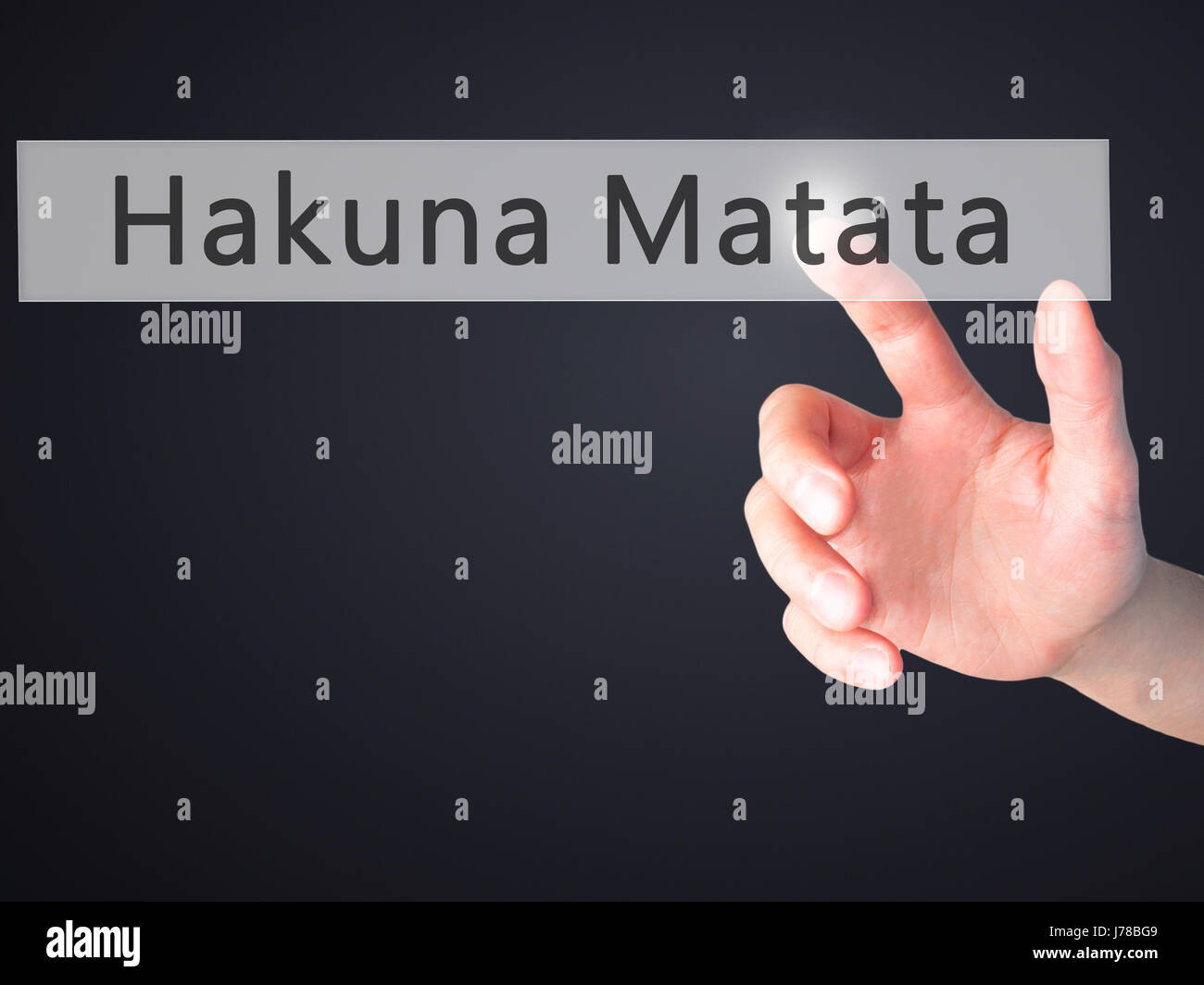 Hakuna Matata (Swahili phrase it means no worries) Hand pressing a button on blurred