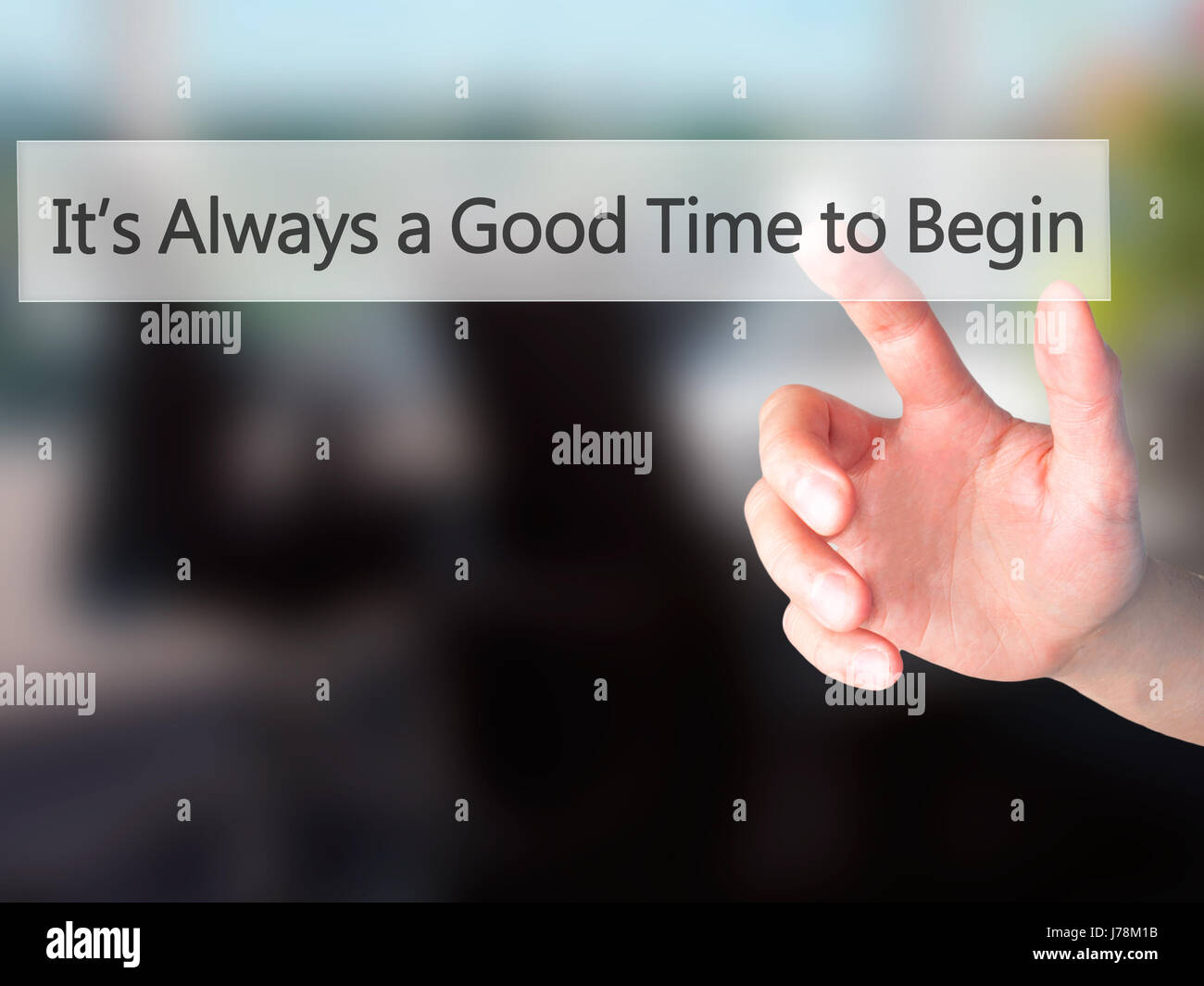 It's Always a Good Time to Begin - Hand pressing a button on blurred ...