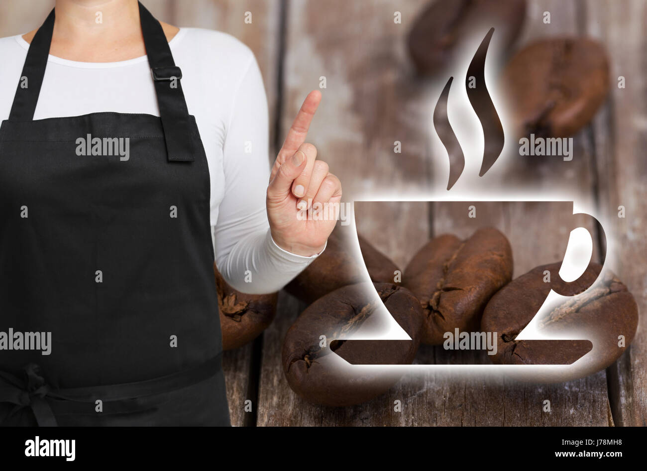 Cafe concept is shown by coffee roasters. Stock Photo