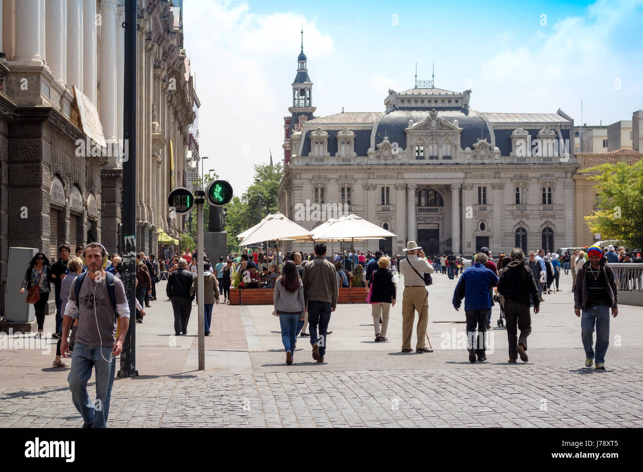 SANTIAGO, CHILE - OCTOBER 23, 2016: People walking on Plaza de Armas with Central Post Office Building (Correo Central) on the background. This is a h Stock Photo