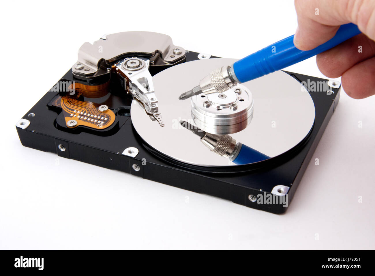 tool open defect screwdriver fixed-disk drive hard disk hard drive PC  computers Stock Photo - Alamy