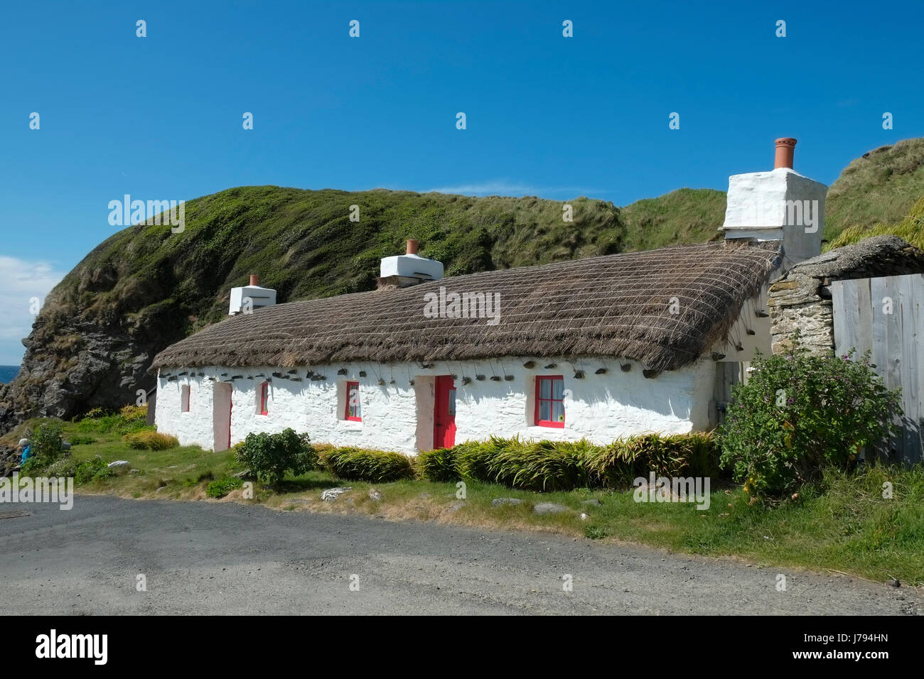 Niarbyl, Isle of Man, showing the beach, bay, row of cottages and a fisherman's hut, used for the filming of 'Waking Ned Devine'. Stock Photo