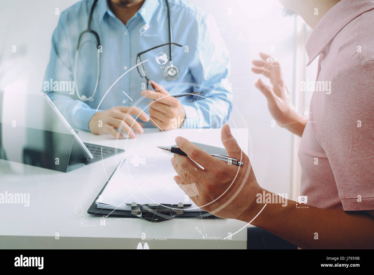 Medical doctor using mobile phone and consulting businessman patient having exam as Hospital professionalism concept with VR icon diagram Stock Photo