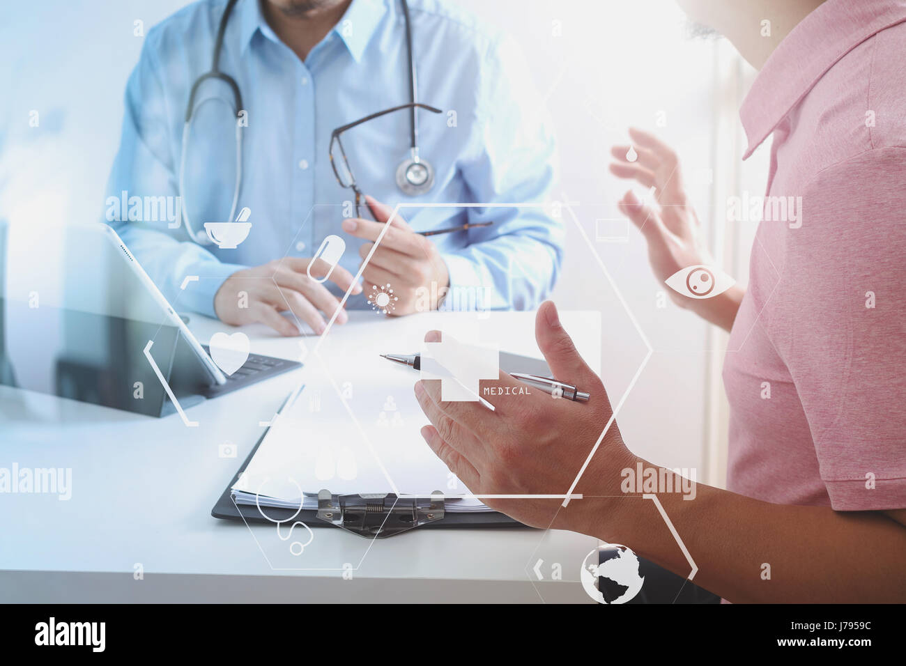 Medical doctor using mobile phone and consulting businessman patient having exam as Hospital professionalism concept with VR icon diagram Stock Photo