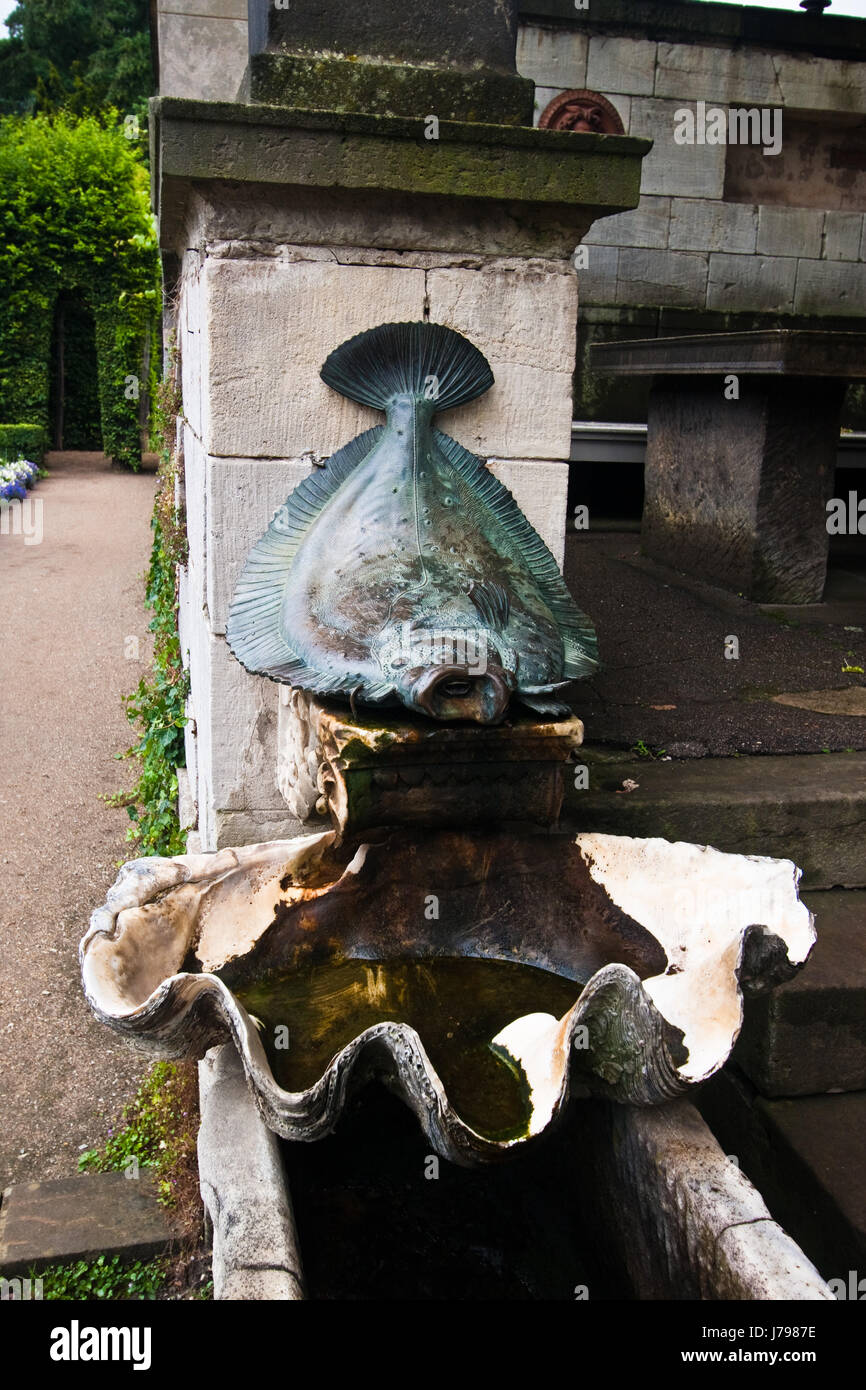 sculpture fish shell flounder water potsdam sculpture fish shell fountain Stock Photo