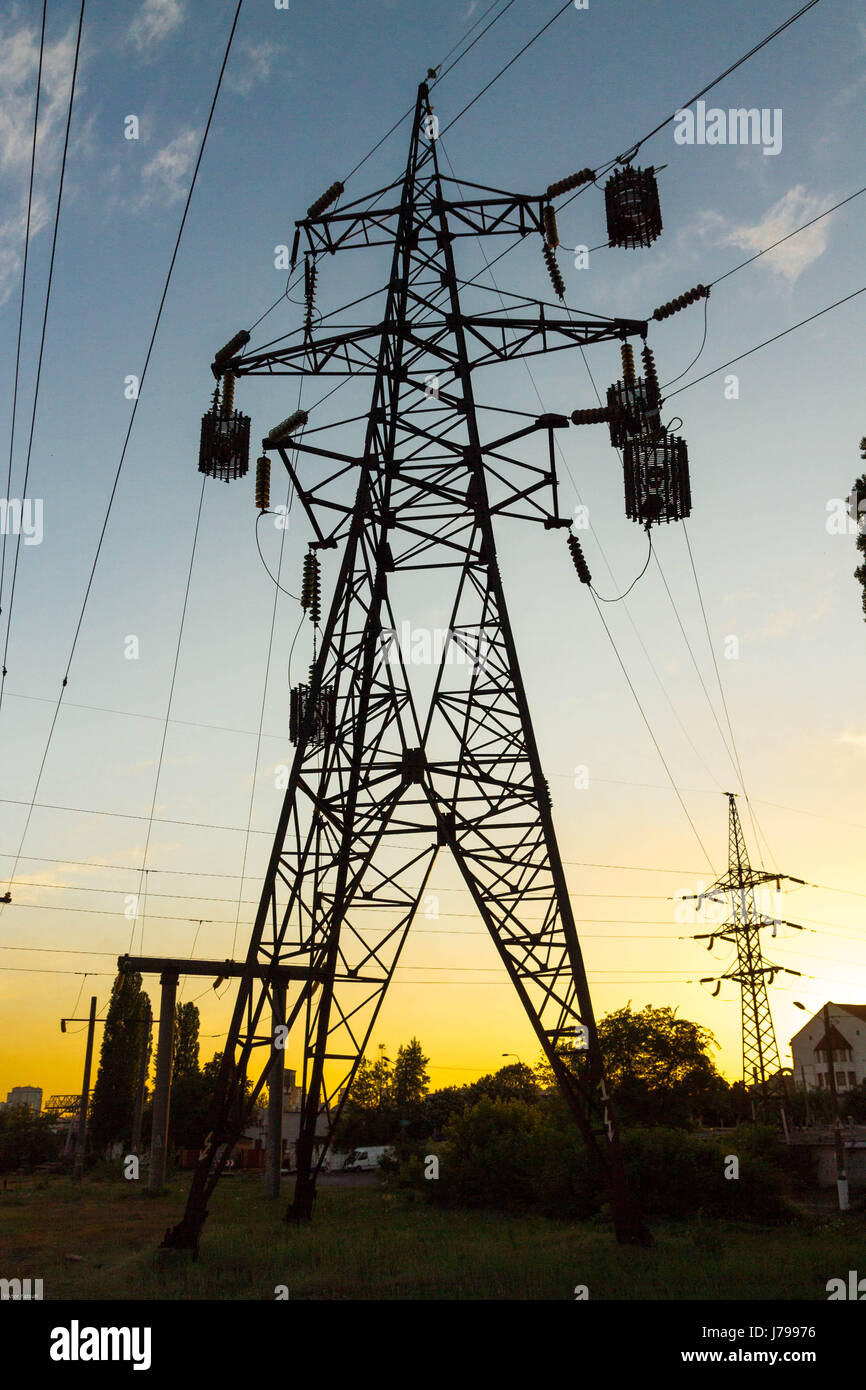 Power line against blue sky and sun power lines hi-res stock ...