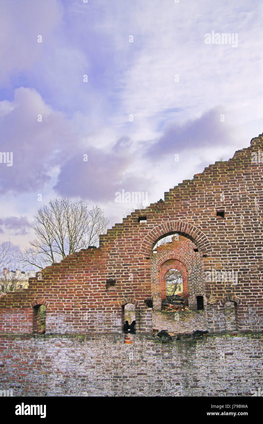 wall ruins dilapidated abandoned demolished bricks building house building city Stock Photo