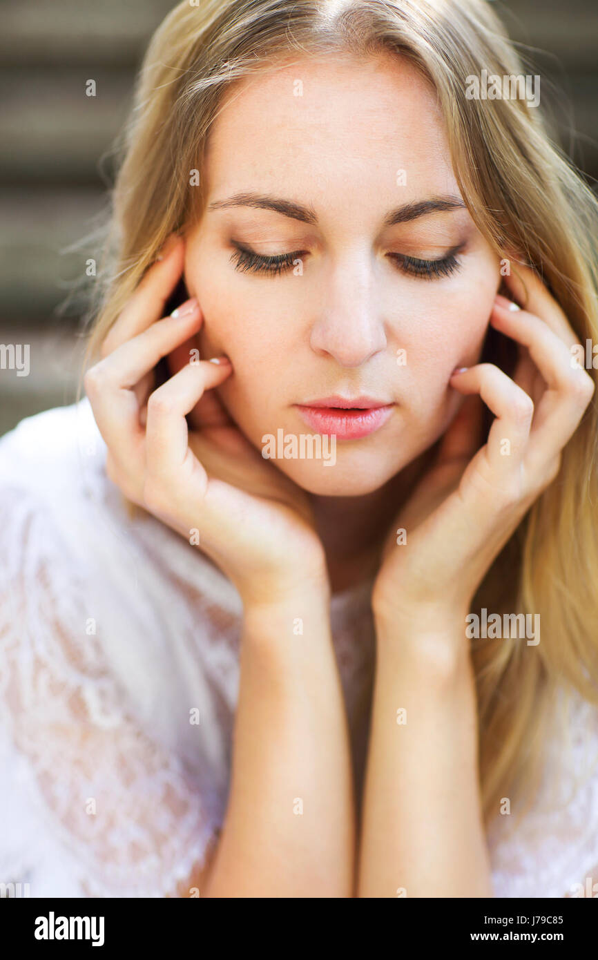 Portrait of a beautiful happy bride outdoors in park Stock Photo - Alamy