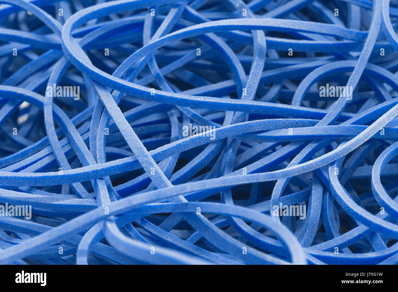 blue rubber bands background Stock Photo - Alamy