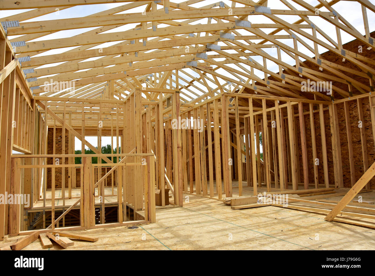 New wood frame homes under construction Stock Photo Alamy