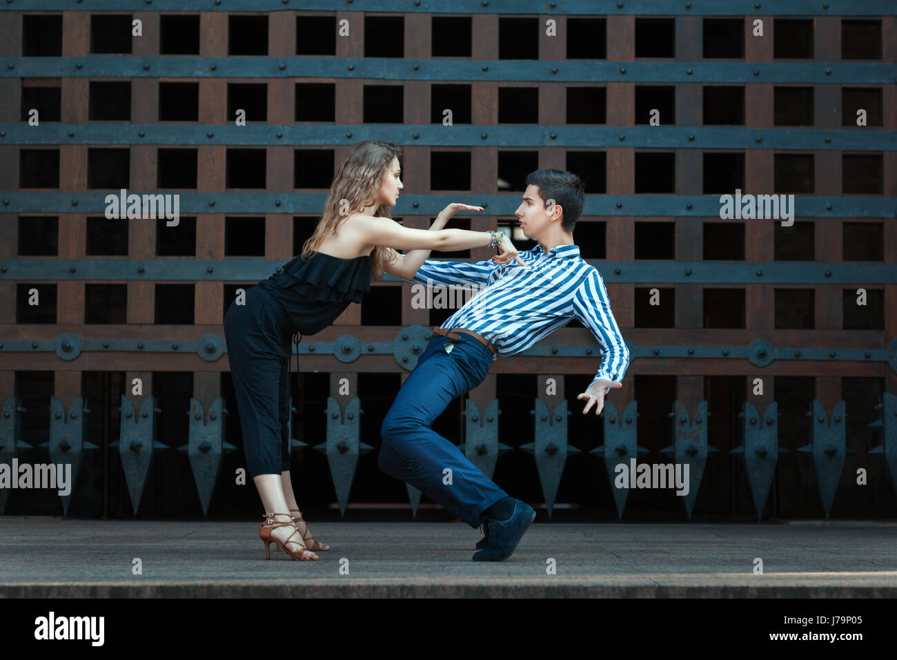 Young couple dancing the dance. They are professional dancers. See more photos of this series. Stock Photo