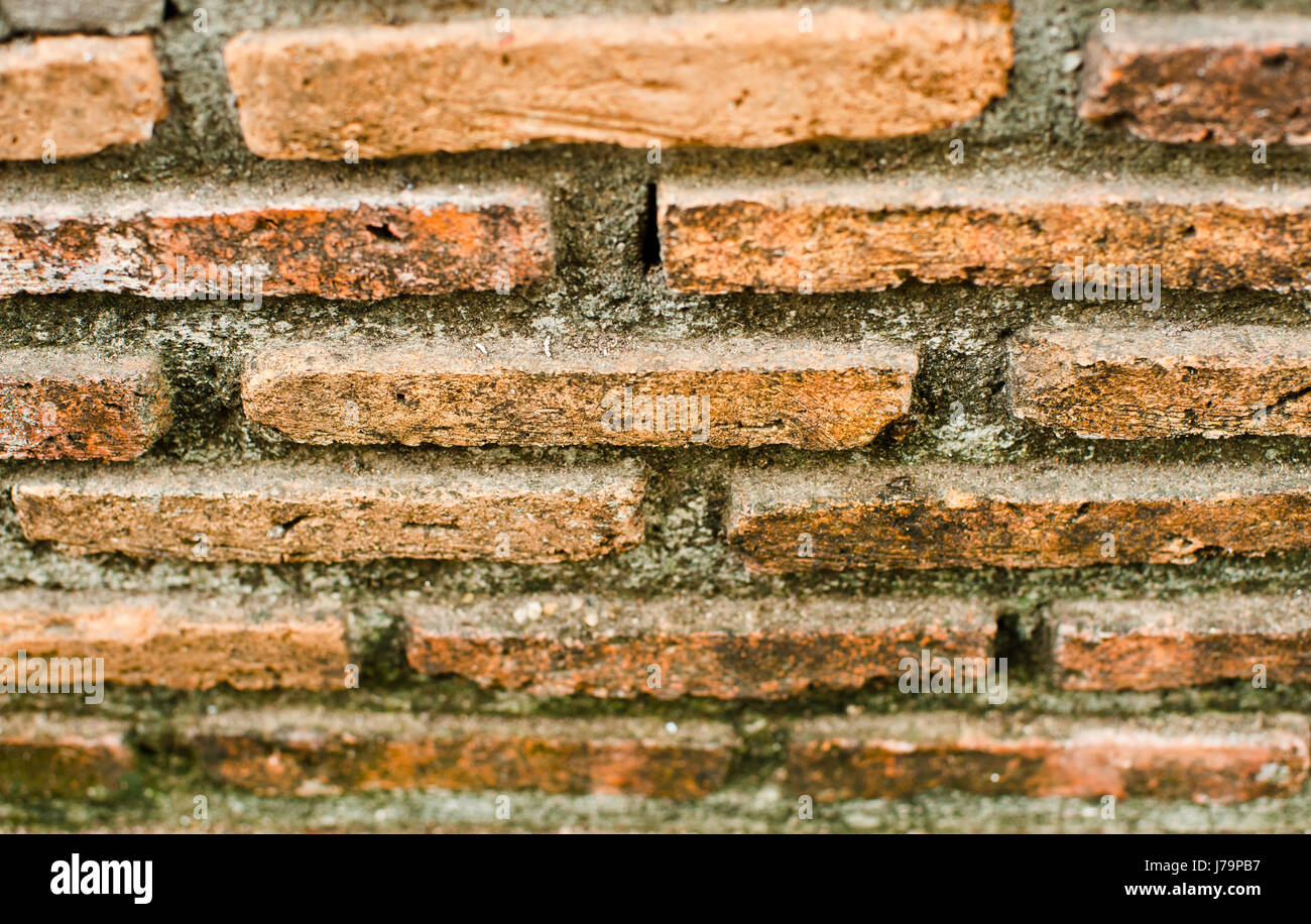 Old brick wall texture in a background image Stock Photo - Alamy