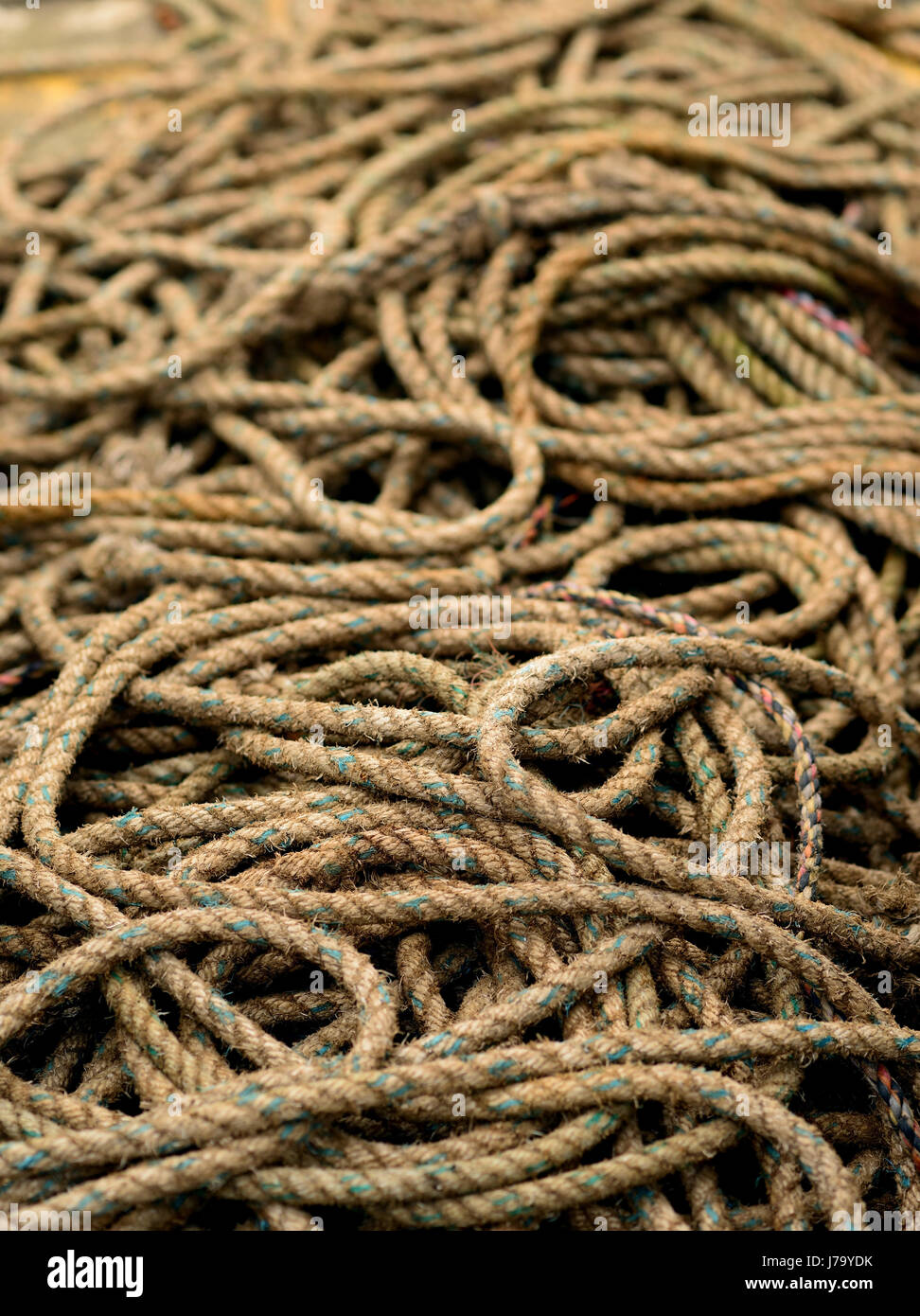 A pile of rope in a fishing port Stock Photo - Alamy