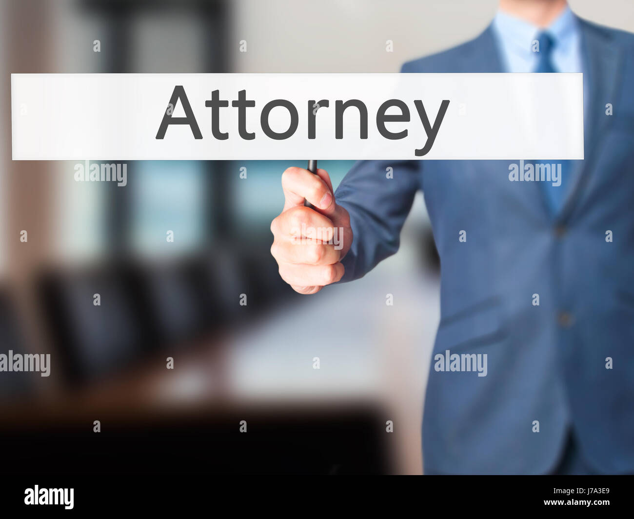 Attorney - Business man showing sign. Business, technology, internet concept. Stock Photo Stock Photo
