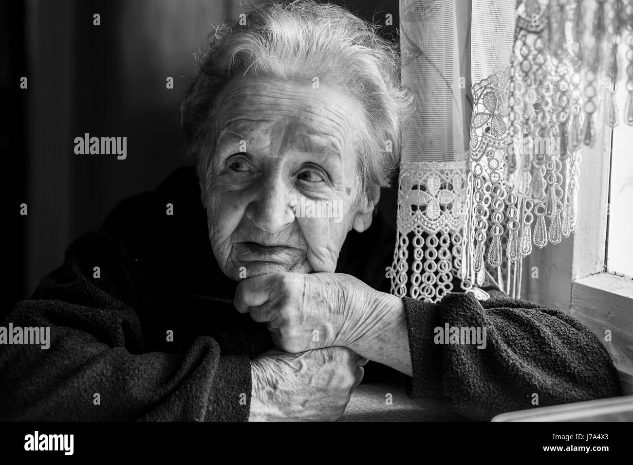 Black-and-white portrait of an elderly woman. Stock Photo