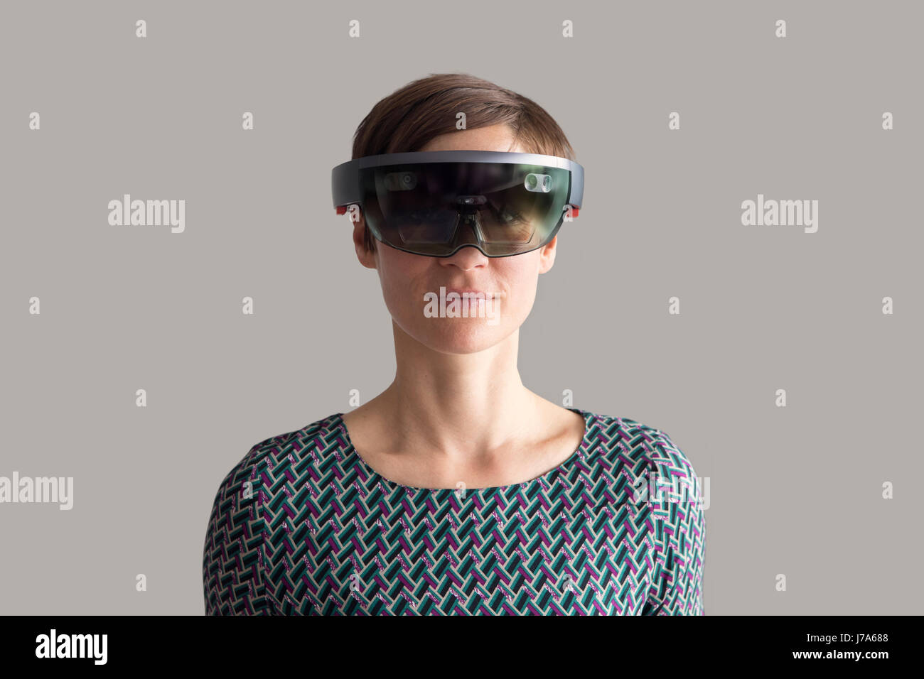 Woman wearing mixed reality smartglasses Stock Photo
