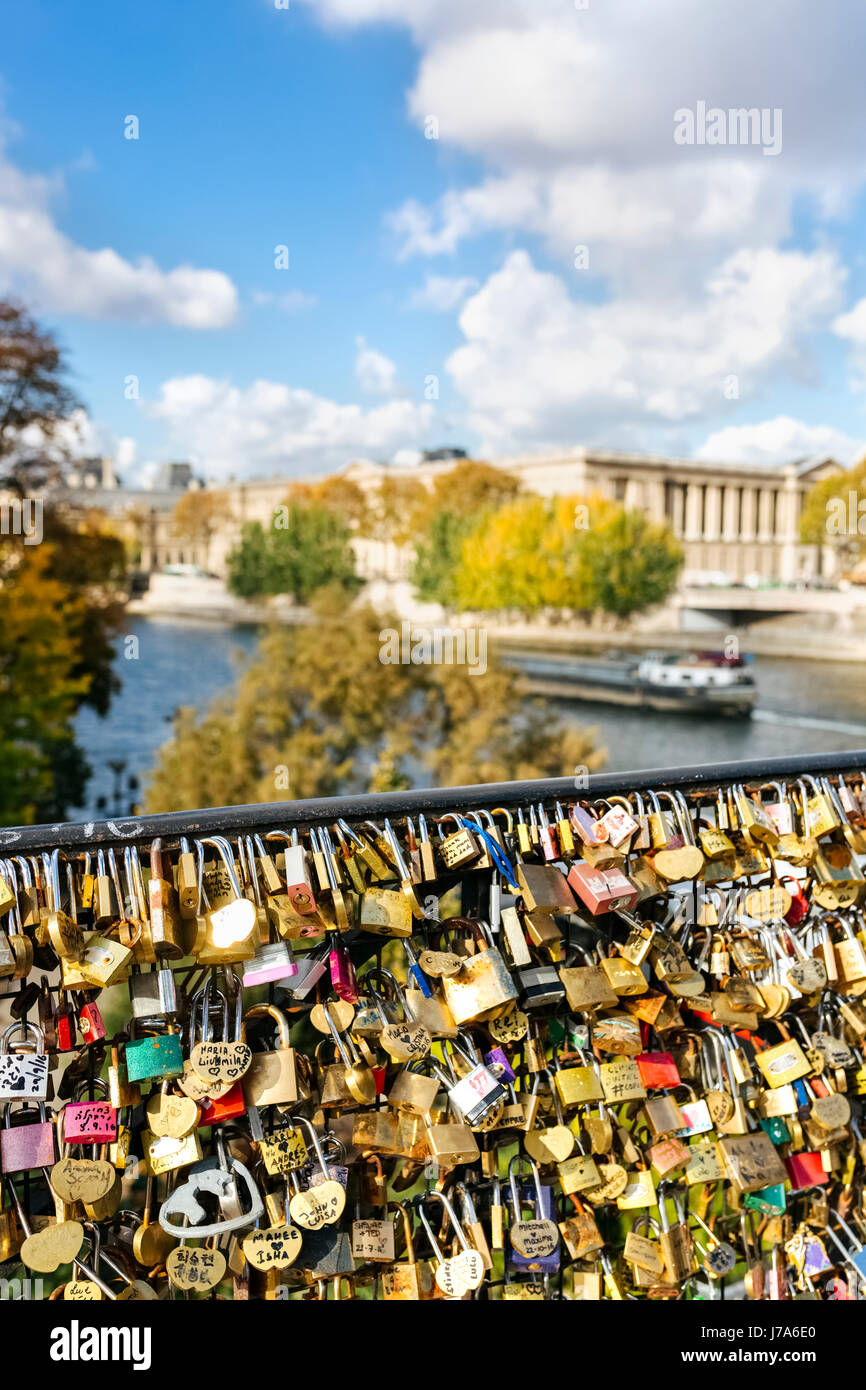 France, Paris, love locks at railing of a bridge over Seine River Stock Photo