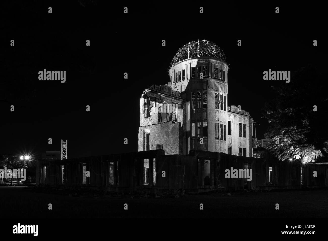 The A-Dome,illuminated by artificial light, stands out in the darkness of the night.This black & white photo depicts the somber mood felt at the site. Stock Photo