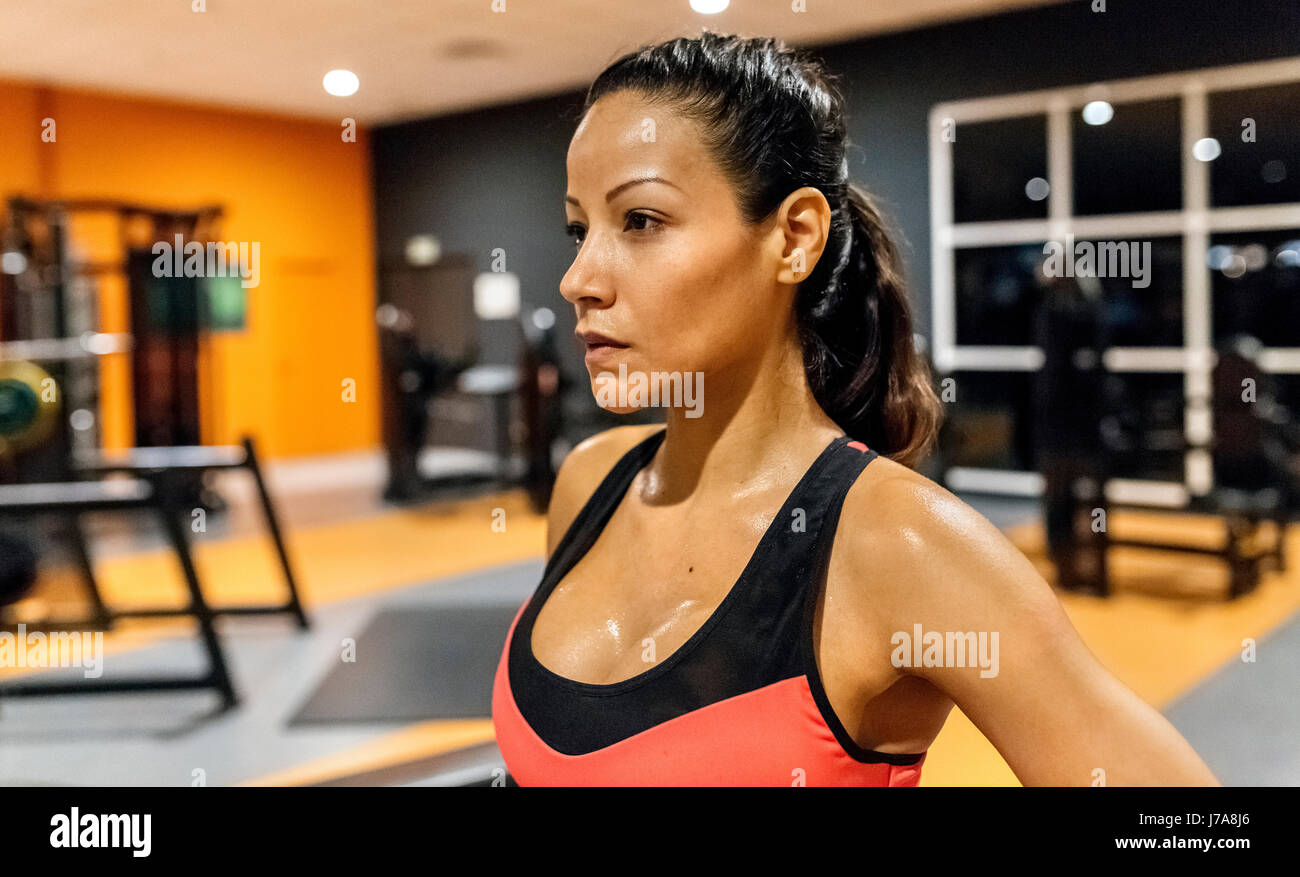 Portrait of a woman sweating after training in the gym Stock Photo - Alamy