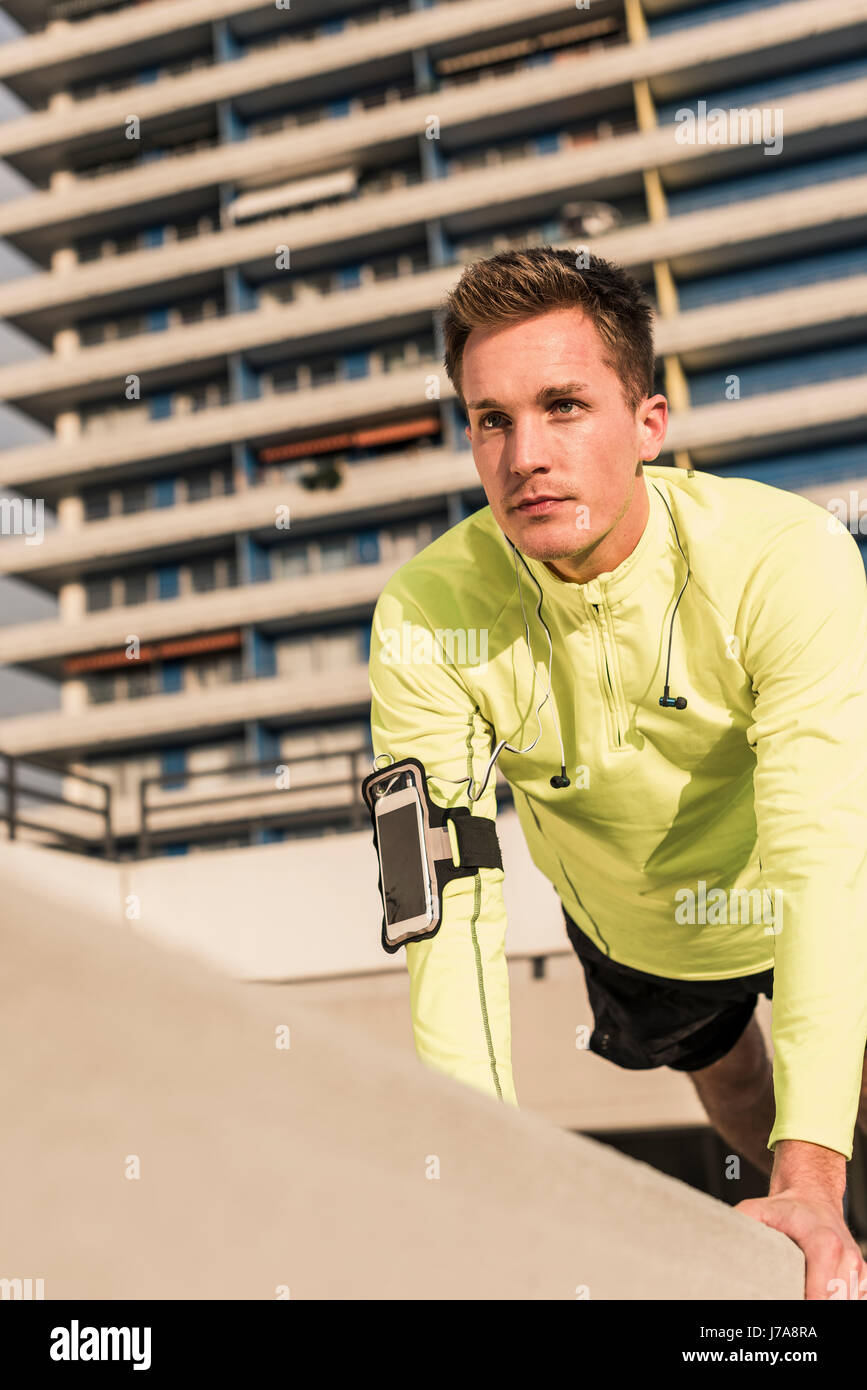 Young athlete exercising push ups on parking level Stock Photo Alamy