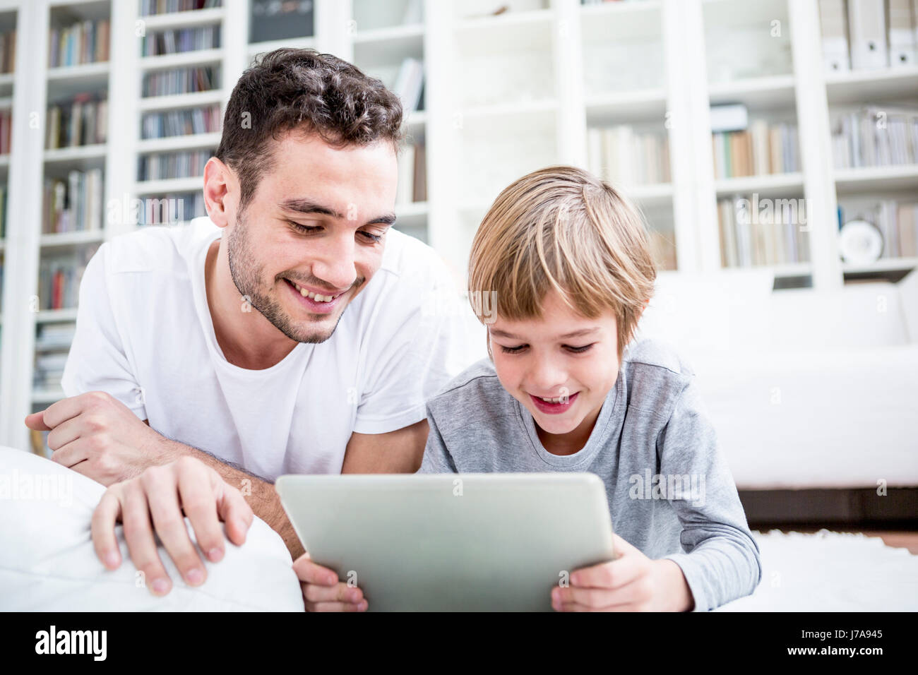 Father smiling son using hi-res stock photography and images - Alamy