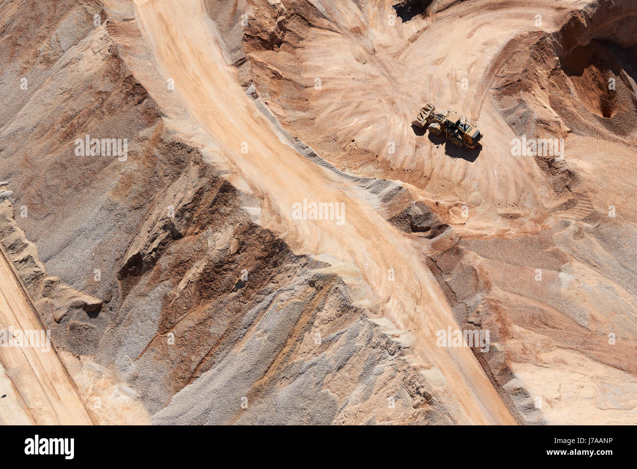 USA, Texas, aerial view of sand mine near San Antonio with a grader