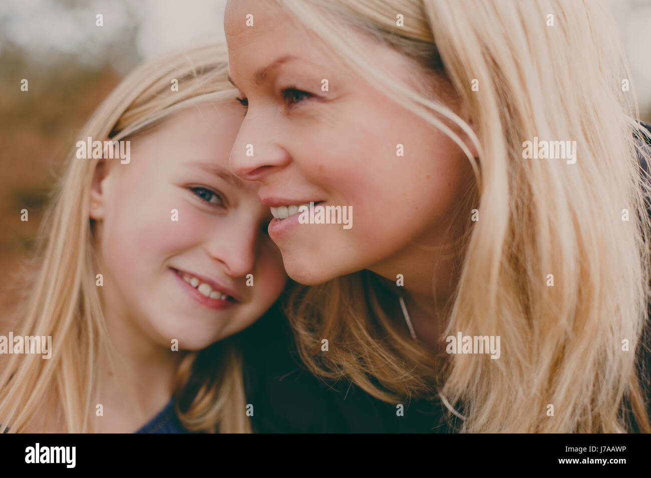 Happy mother with daughter outdoors Stock Photo