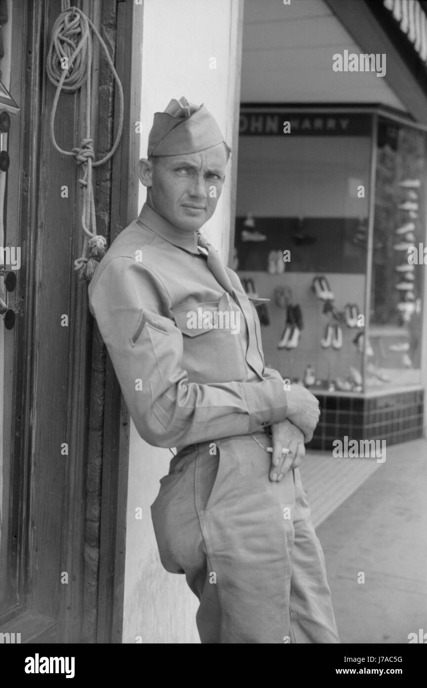 Soldier from Fort Benning on a street in Columbus, Georgia, 1941. Stock Photo
