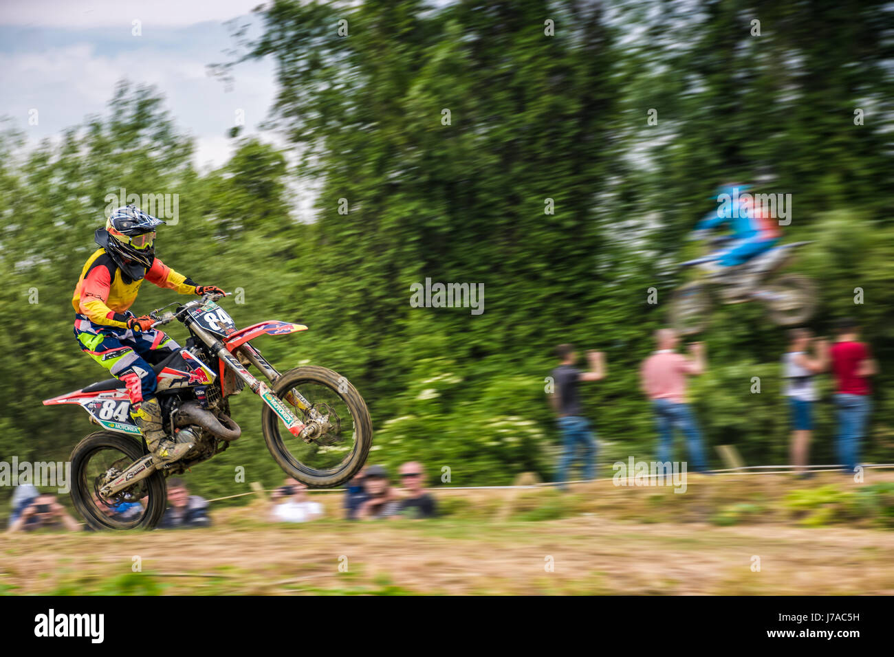 Uzhgorod, Ukraine - May 21, 2017: Extreme enduro MOTO SPORT Rider in the action. Motion blur with flying dirt. TransCarpathian regional Motocross Cham Stock Photo