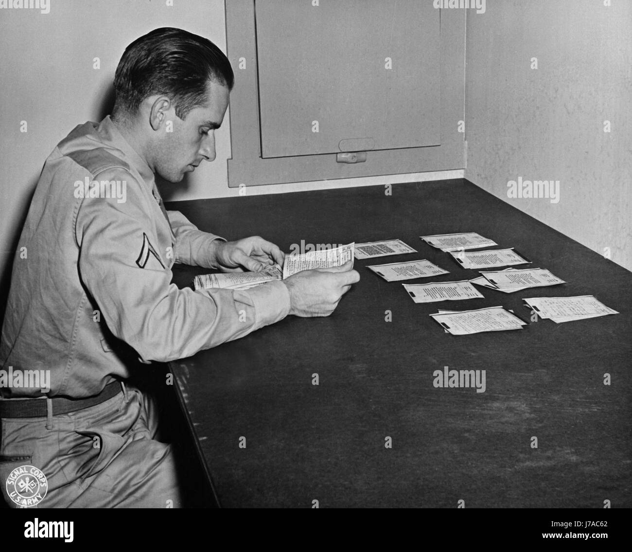 Finished V-mail letters are sorted and prepared for forwarding to addressees, 1943. Stock Photo