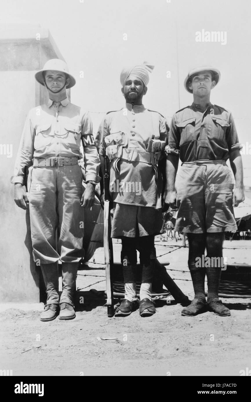 American, Indian and Royal Air Force guards somewhere in India. circa 1942 Stock Photo