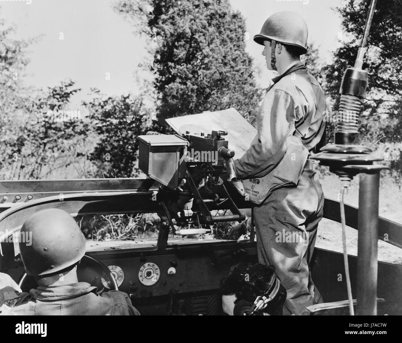 Soldiers of a reconnaissance squad with the Second Army, in a scout car, circa 1942. Stock Photo