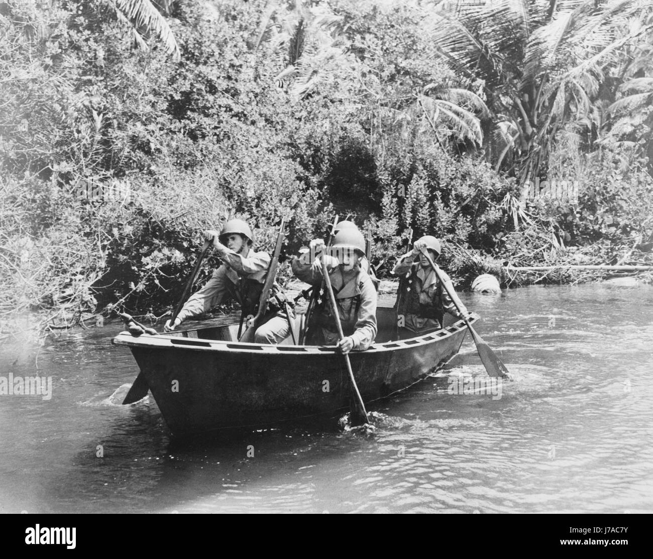 U.S. troops patrolling the Caribbean area in an assault boat, circa 1942. Stock Photo