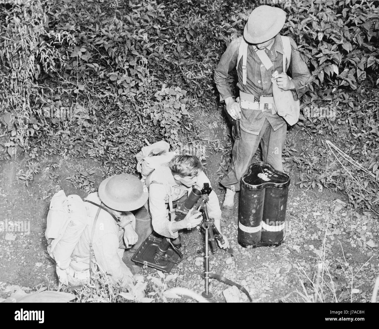 American troops set up a small trench mortar while stationed in Jamaica, circa 1942. Stock Photo