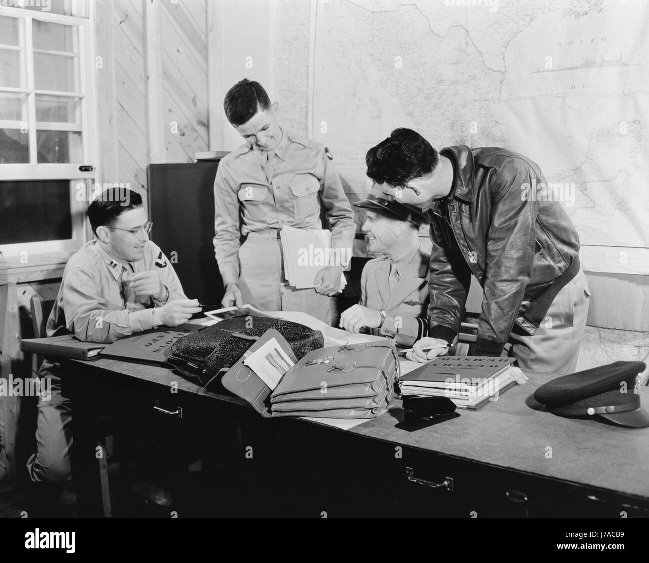 Pilots of the United States Army air transport command in discussion, 1943. Stock Photo