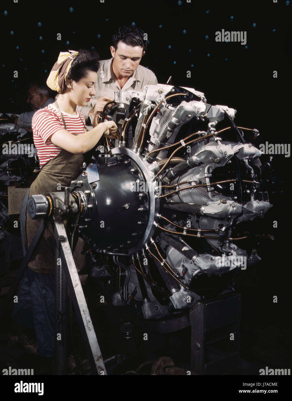 Women are trained as engine mechanics at Douglas Aircraft Company, 1942. Stock Photo