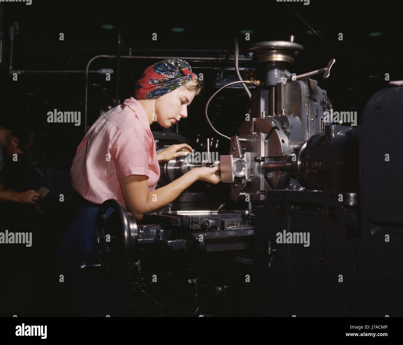 Woman machinist at the Douglas Aircraft Company plant, 1942. Stock Photo