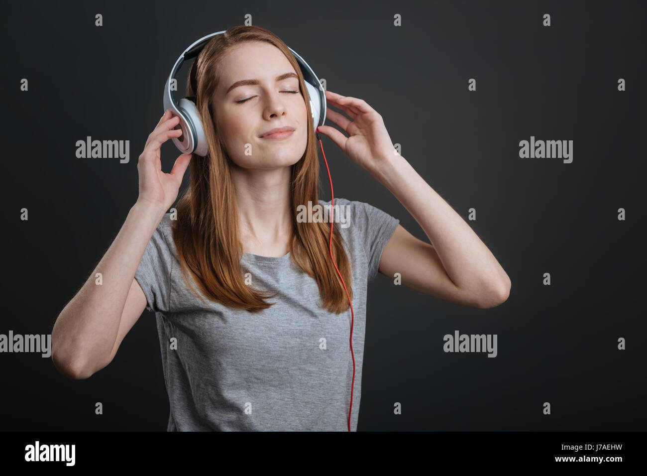 Creative stunning woman enjoying the sound Stock Photo