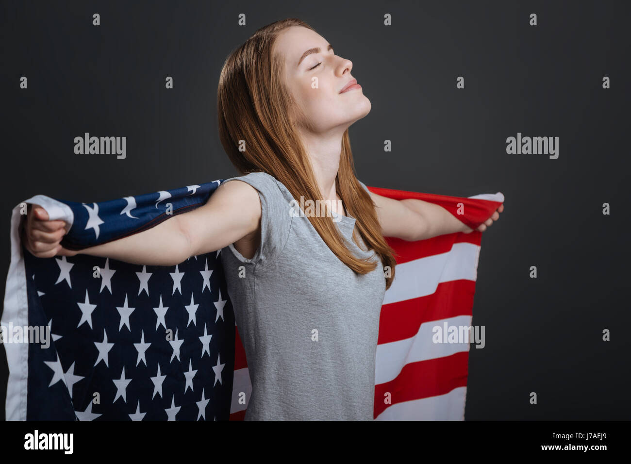 Inspired sweet girl being a real patriot Stock Photo
