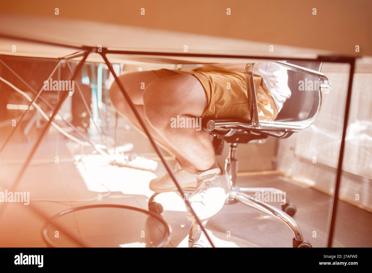 Legs under table hires stock photography and images Alamy